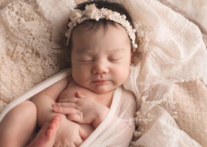 newborn girl on layers
